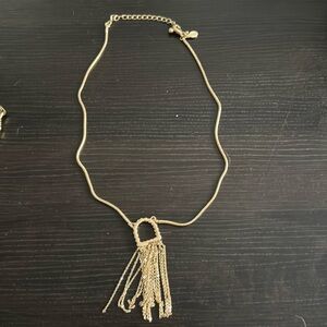 Gold dangle shape necklace